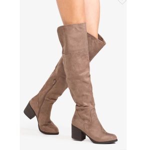 Pair of brown leather knee-high boots